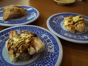 (upper left) seared salmon with Teriyaki sauce, (lower left) seared shrimp with cheese sauce, (right) seared salmon with cheese sauce